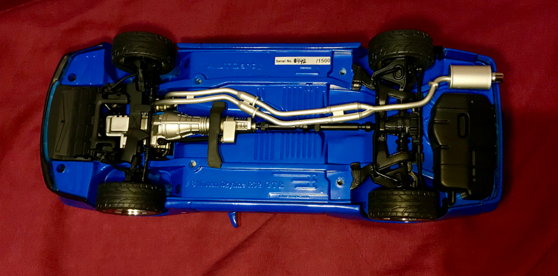 The chassis is likewise detailed beautifully. We can see the four wheel drive system, and the rear steering assembly. However, only the front wheels steer. The chassis itself, including the front lip, is made out of plastic. Finally, the serial number indicates that this particular model is No. 442 of a limited run of 1,500.